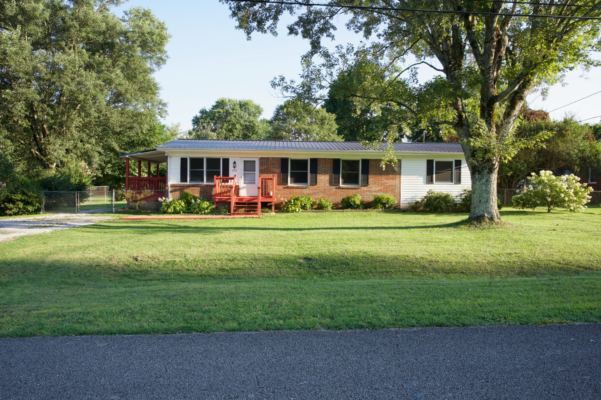 570 Forest Circle Sparta, TN 38583 - Photo 3 of 27 a front view of house with yard and green space