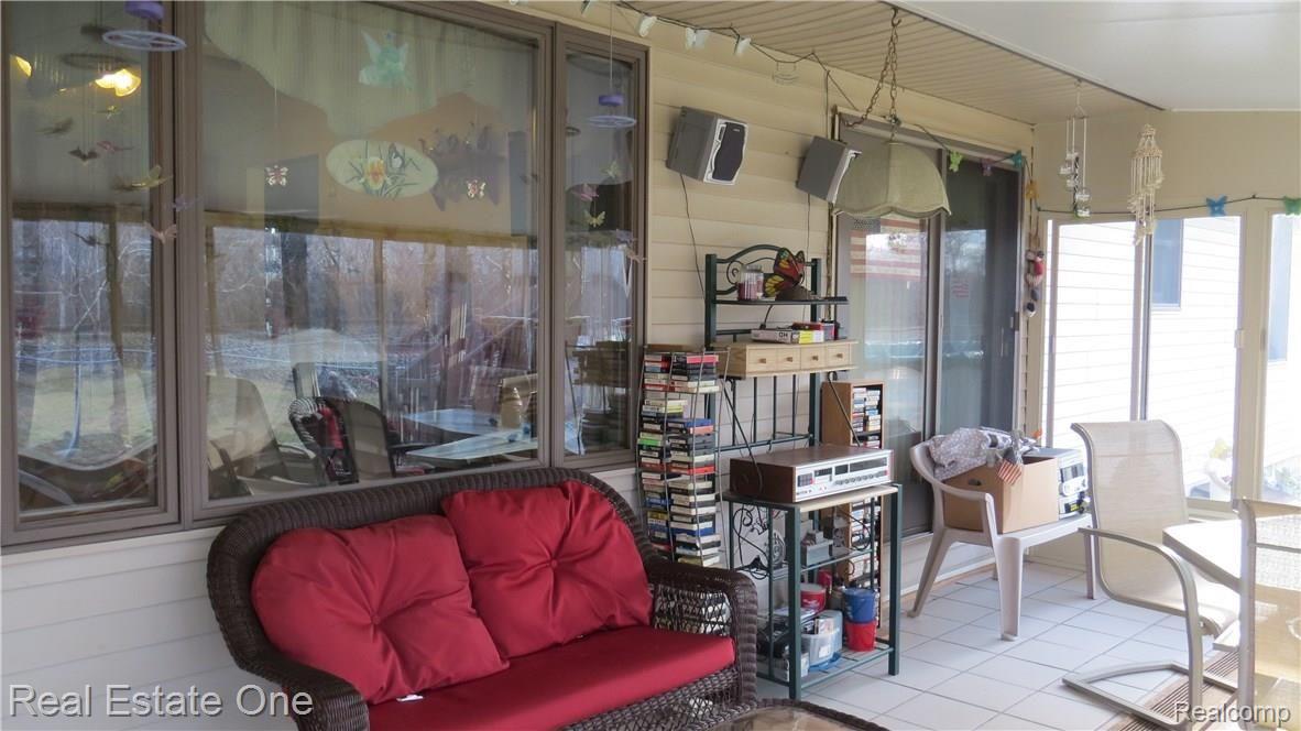 30550 Fort Road Rockwood, MI 48173 - Photo 23 of 31 Sun Room