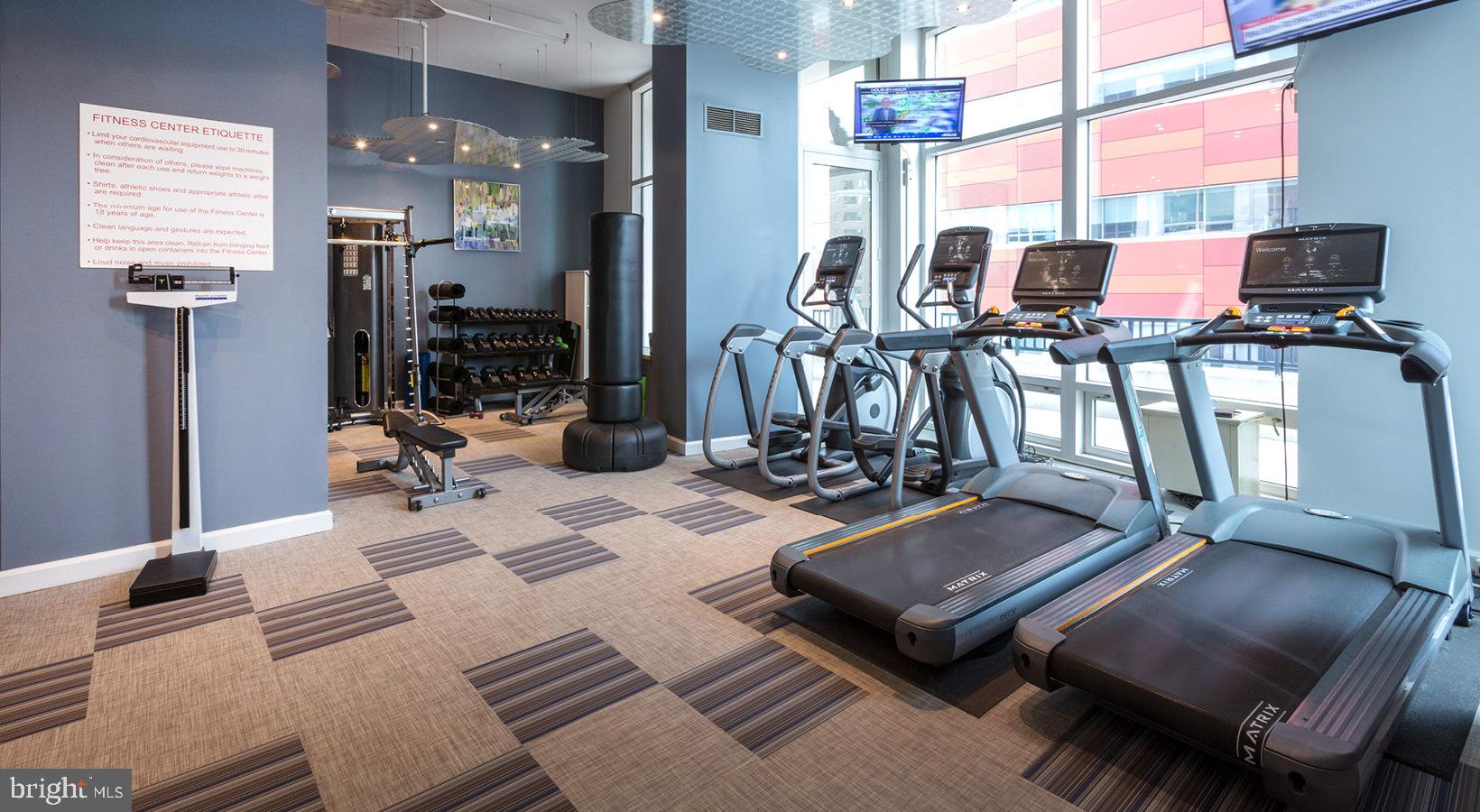 207 West Washington Square, Unit 2801 Philadelphia, PA 19106 - Photo 12 of 19 a view of a workspace with furniture and a window