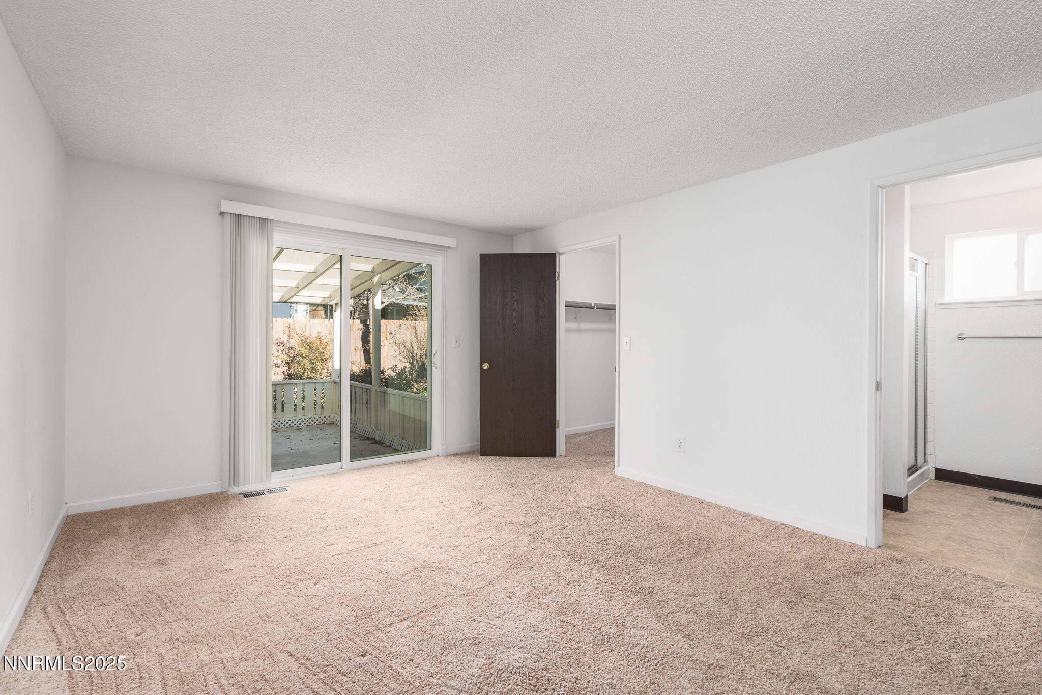 1266 Junction Drive Sparks, NV 89434 - Photo 19 of 32 a view of an empty room with a window