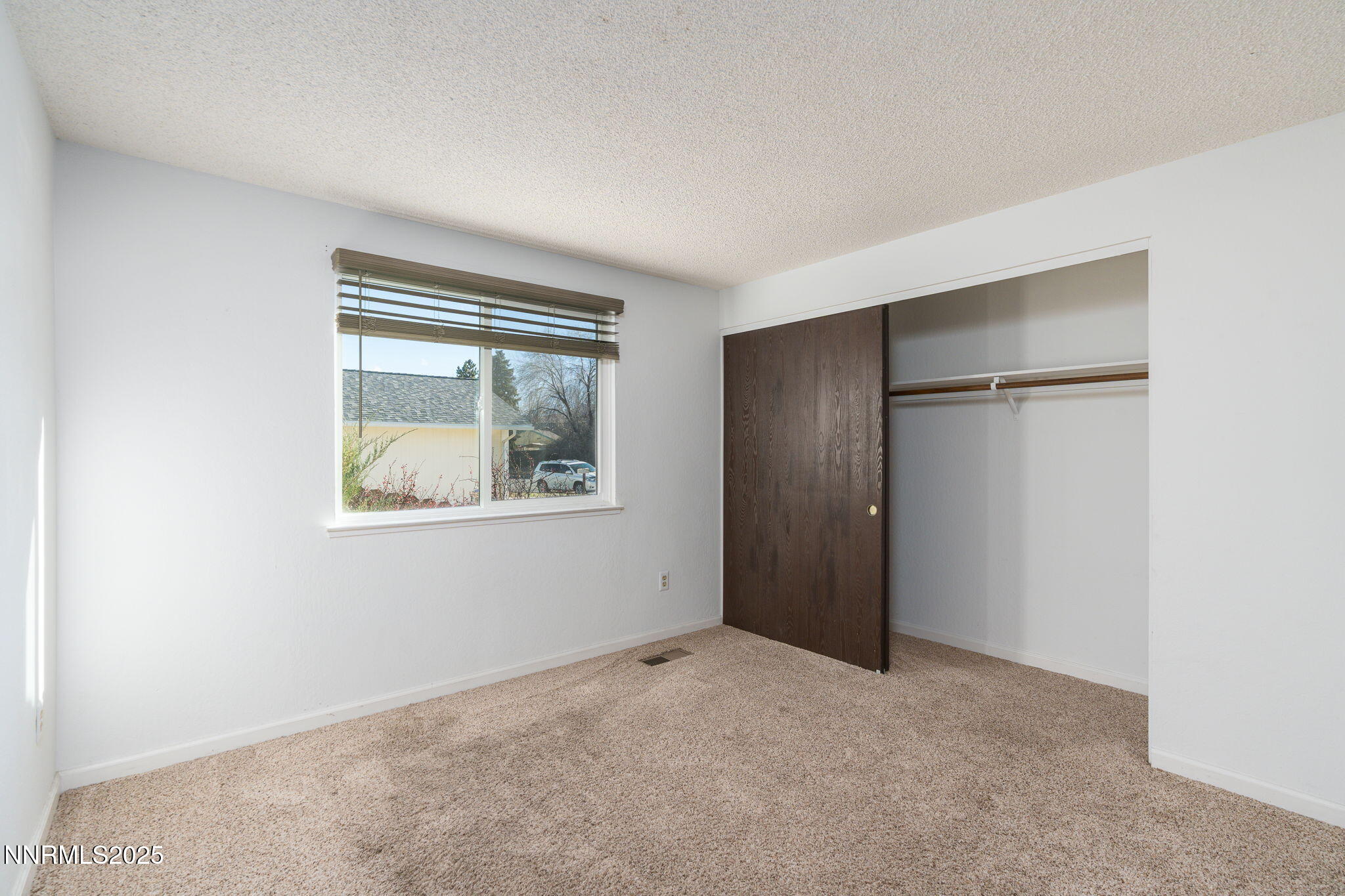 1266 Junction Drive Sparks, NV 89434 - Photo 26 of 32 a view of an empty room with a window