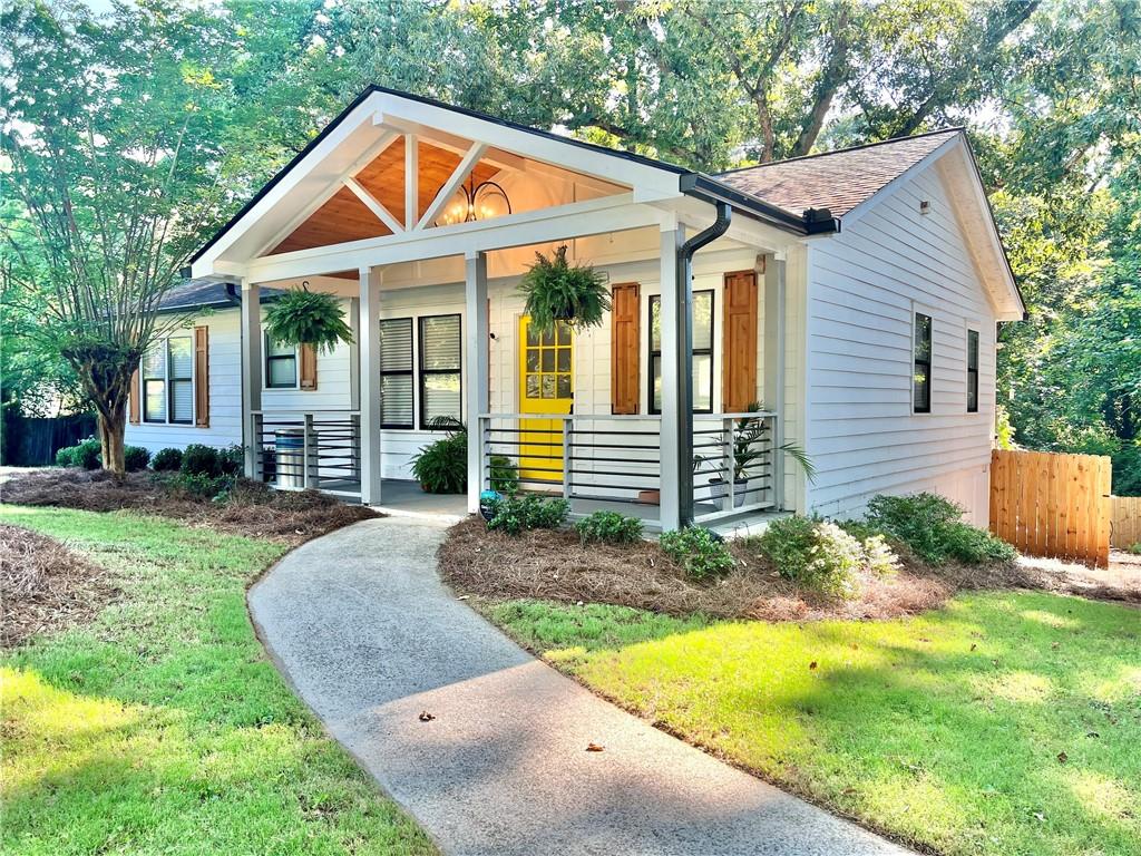 1668 Delano Drive Decatur, GA 30032 - Photo 1 of 1 a front view of a house with garden