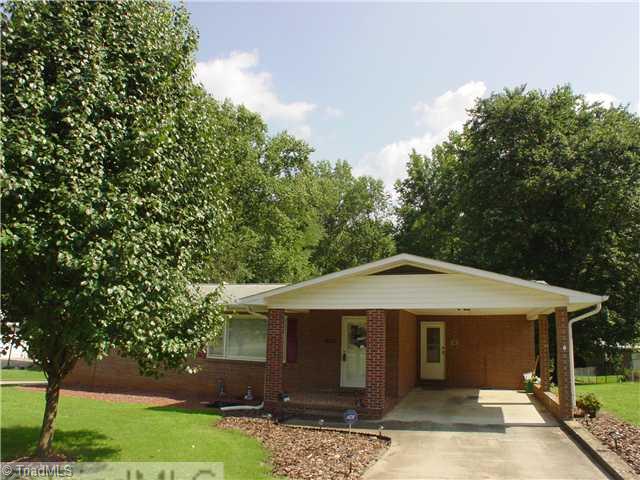 5016 Sitka Road Walkertown, NC 27051 - Photo 1 of 12 Exterior Front. Solid brick ranch with car port and covered porch.