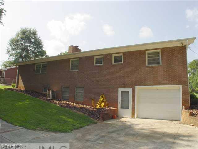 5016 Sitka Road Walkertown, NC 27051 - Photo 11 of 12 Exterior Back. View of back of the house with walk out basement.
