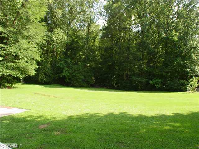 5016 Sitka Road Walkertown, NC 27051 - Photo 12 of 12 Yard/Garden. Large, open yard has mature shade trees.
