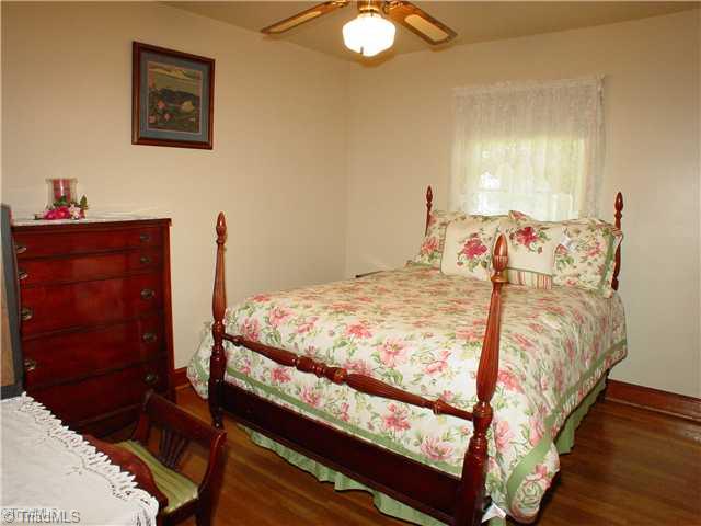 5016 Sitka Road Walkertown, NC 27051 - Photo 6 of 12 3rd Bedroom. Hardwood Floors and ceiling fans in all of the bedrooms.