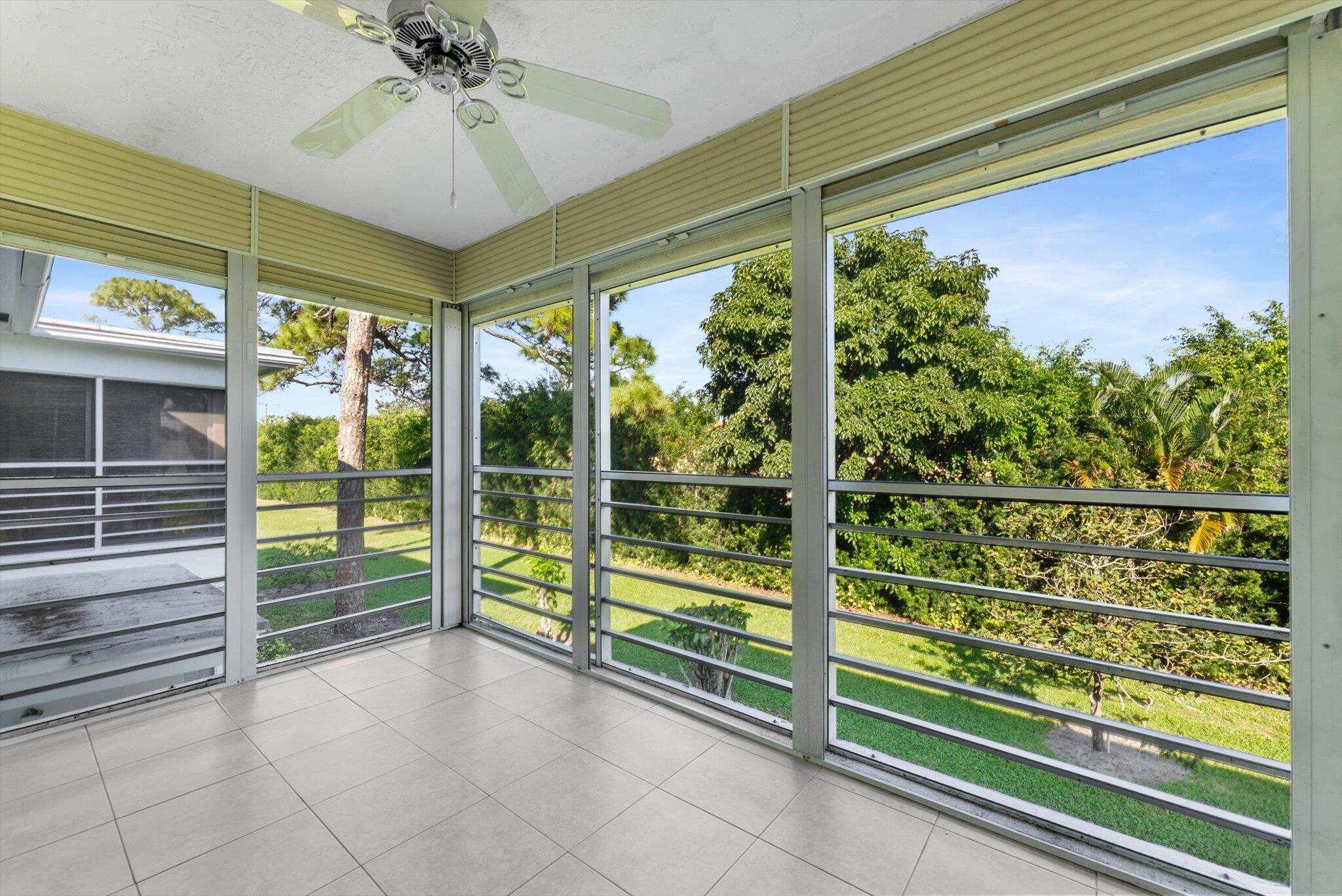 5321 Poppy Place, Unit 203 Delray Beach, FL 33484 - Photo 22 of 31 a view of a porch