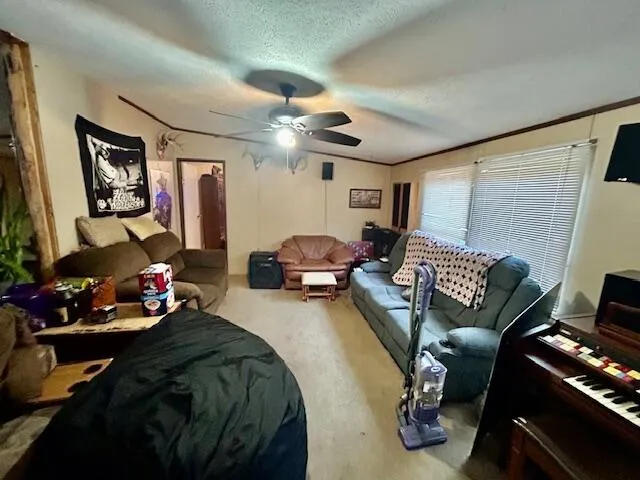 a bedroom with furniture and a chandelier
