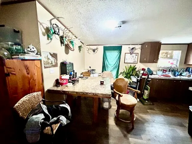 a living room with furniture and a mirror
