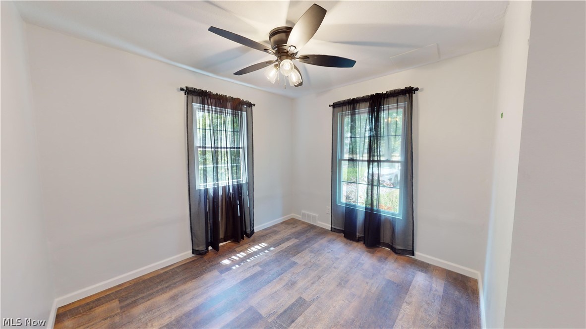 3075 Ludlow Road Cleveland, OH 44120 - Photo 14 of 30 1st floor Bedroom featuring ceiling fan and wood-style floors