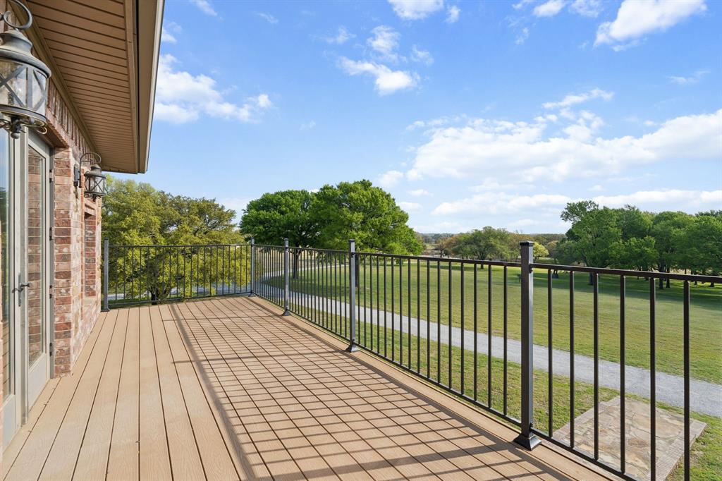 362 County Road 1170 Decatur, TX 76234 - Photo 18 of 32 a view of a pathway with a wrought fence