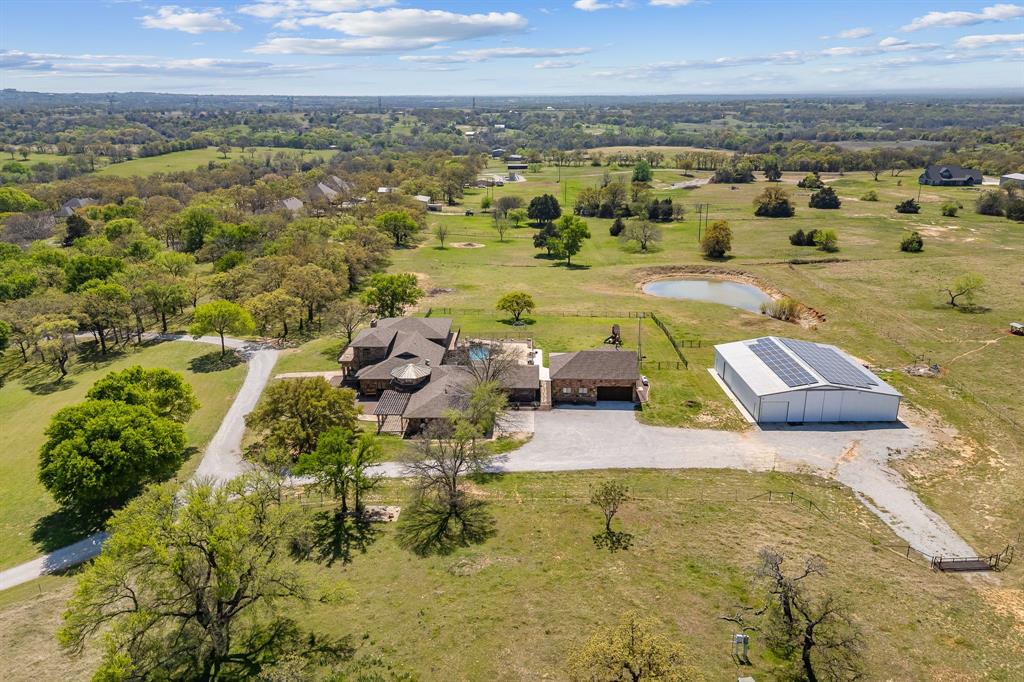362 County Road 1170 Decatur, TX 76234 - Photo 23 of 32 an aerial view of residential houses with outdoor space