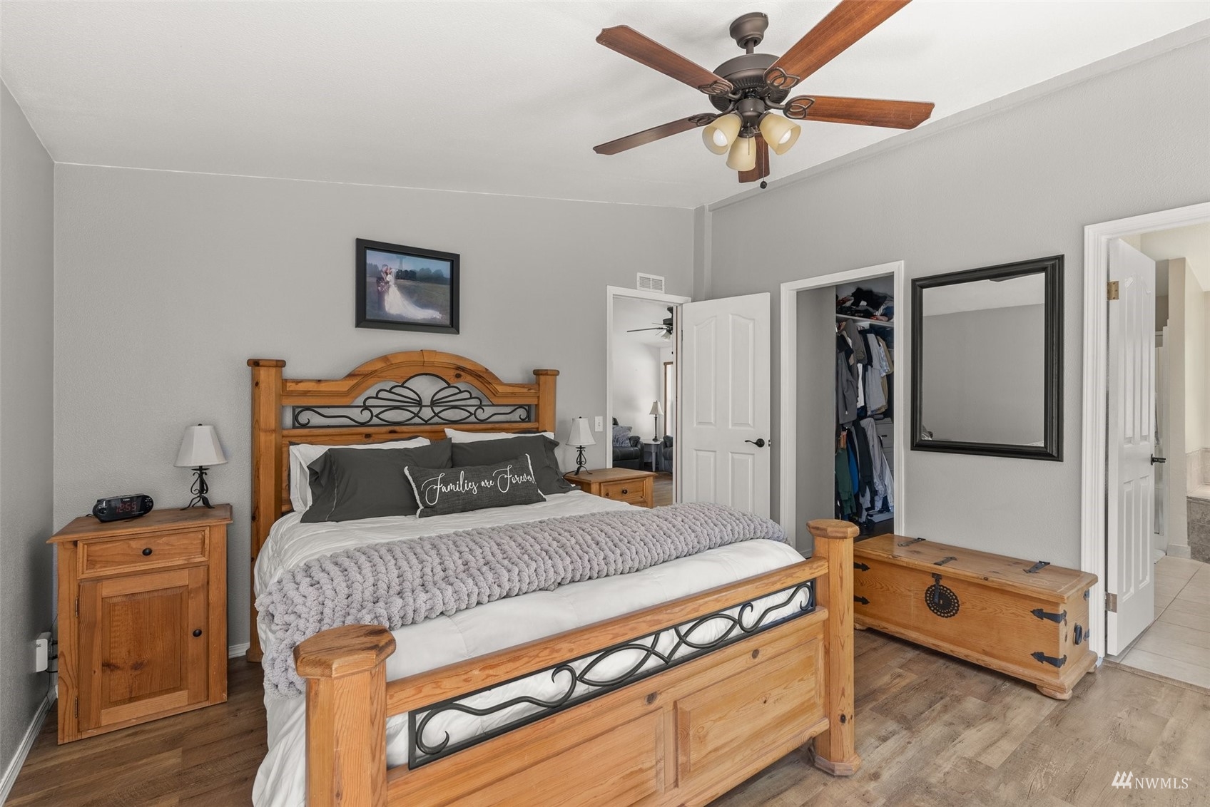 182 Holgate Lane Chehalis, WA 98532 - Photo 18 of 38 a bedroom with a bed and a chandelier