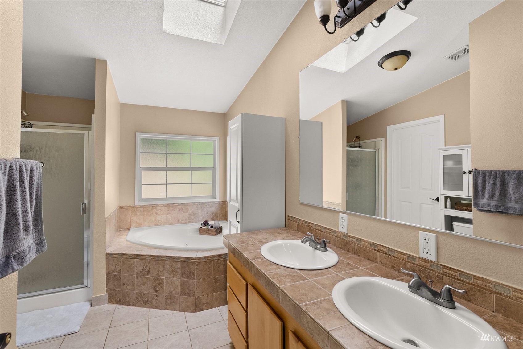 182 Holgate Lane Chehalis, WA 98532 - Photo 19 of 38 a bathroom with a granite countertop sink and a mirror