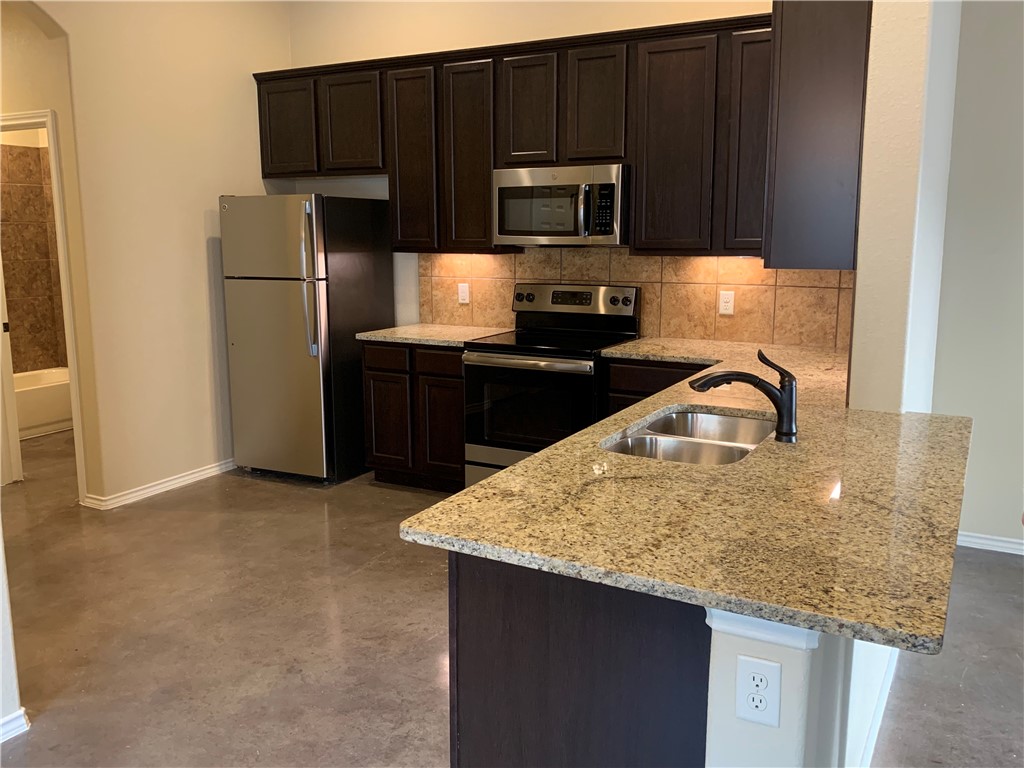 379 Joanne Loop, Unit B Buda, TX 78610 - Photo 16 of 38