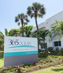 365 North Ocean Boulevard Boca Raton, FL 33432 - Photo 3 of 8 a sign on the side of a building