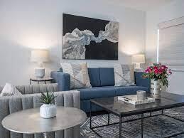 365 North Ocean Boulevard Boca Raton, FL 33432 - Photo 5 of 8 a living room with furniture potted plant and a fireplace