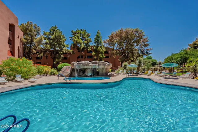 a view of a garden with houses
