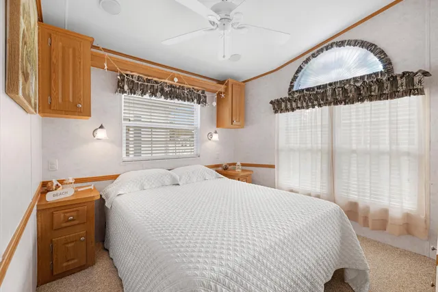 a bathroom with a sink toilet and mirror