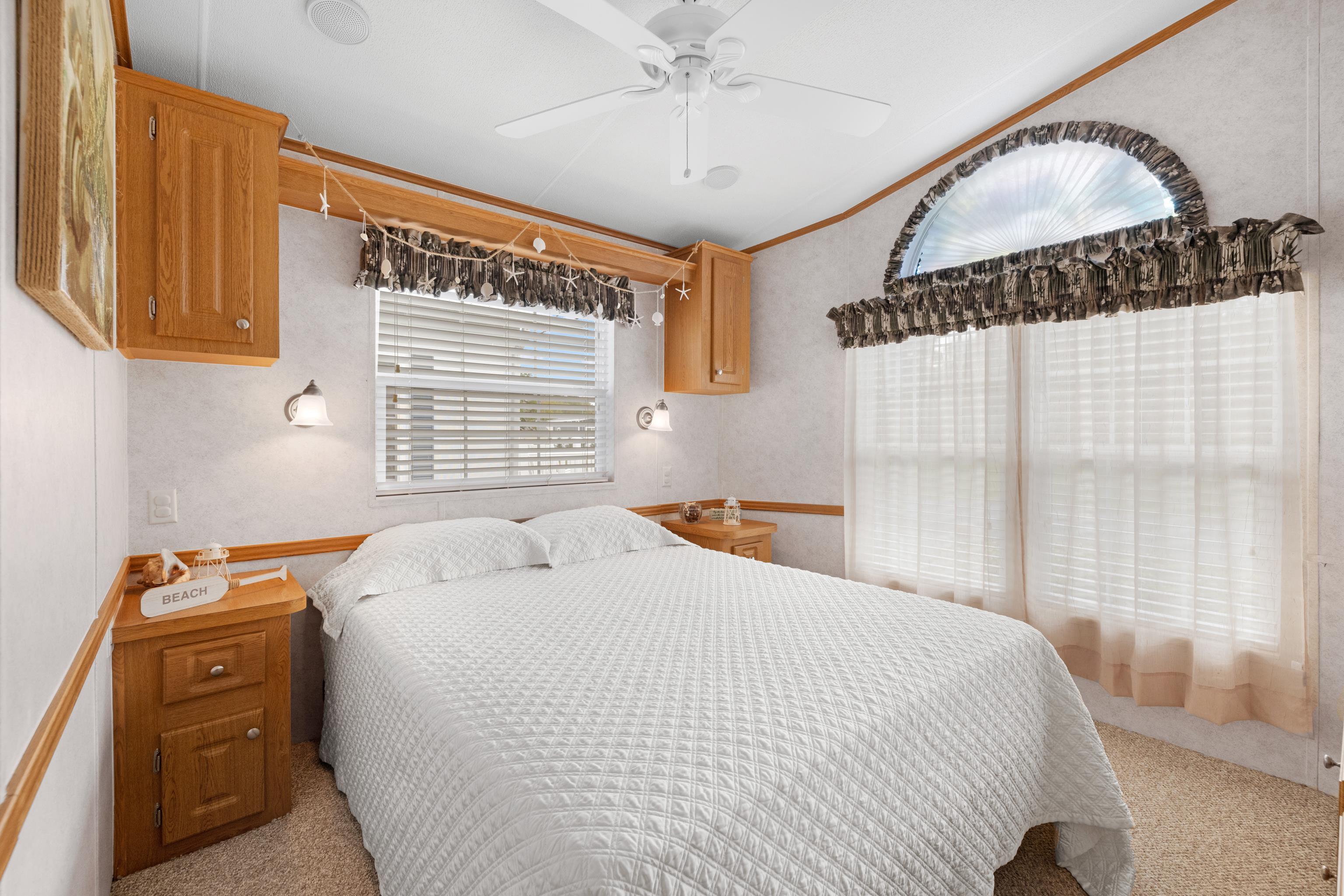 4100 Rte 9 South, Unit 6 Rio Grande, NJ 08242 - Photo 12 of 24 a bedroom with a bed and a window