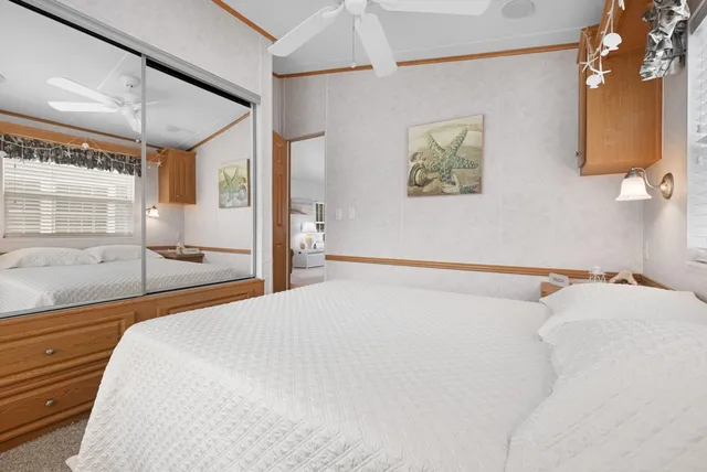 a view of a patio with a table and chairs