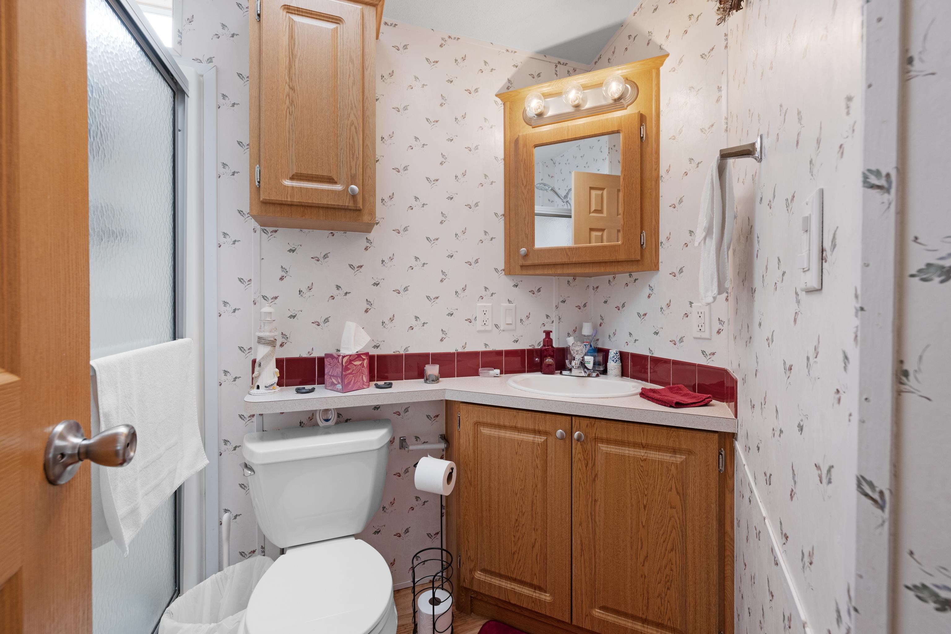 4100 Rte 9 South, Unit 6 Rio Grande, NJ 08242 - Photo 14 of 24 a bathroom with a sink toilet and mirror