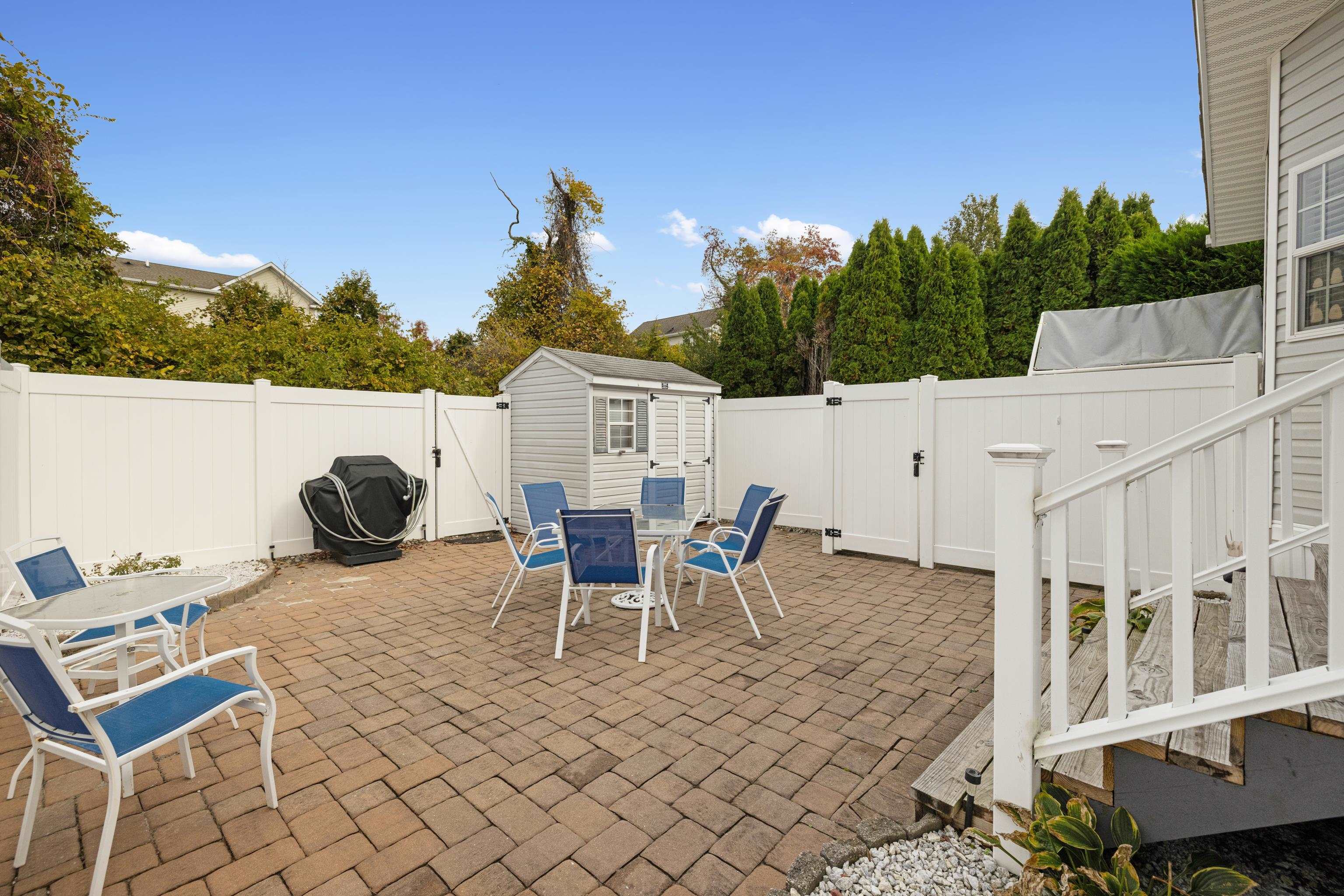 4100 Rte 9 South, Unit 6 Rio Grande, NJ 08242 - Photo 15 of 24 a view of a patio with a table and chairs
