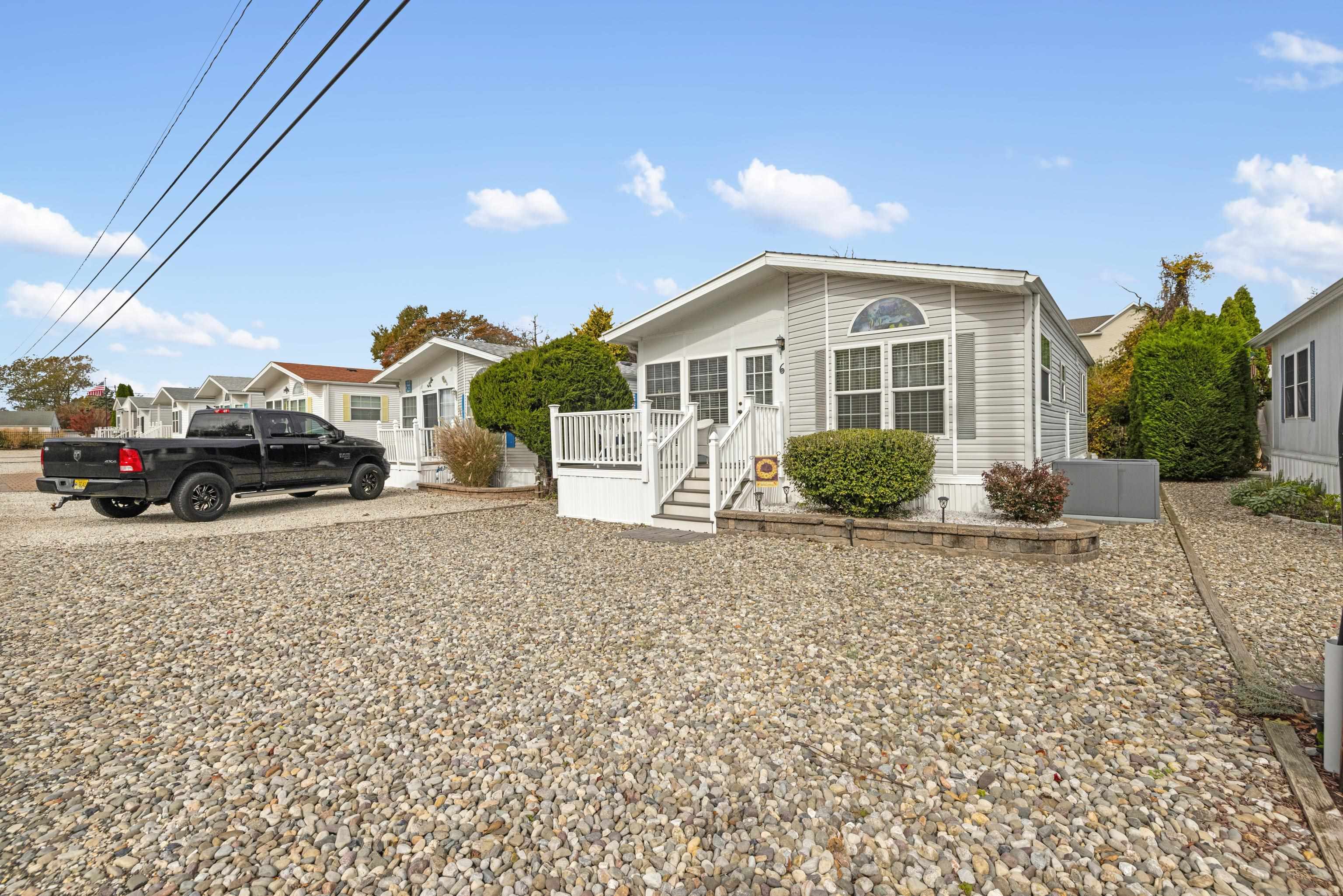 4100 Rte 9 South, Unit 6 Rio Grande, NJ 08242 - Photo 3 of 24 a car parked in front of a house