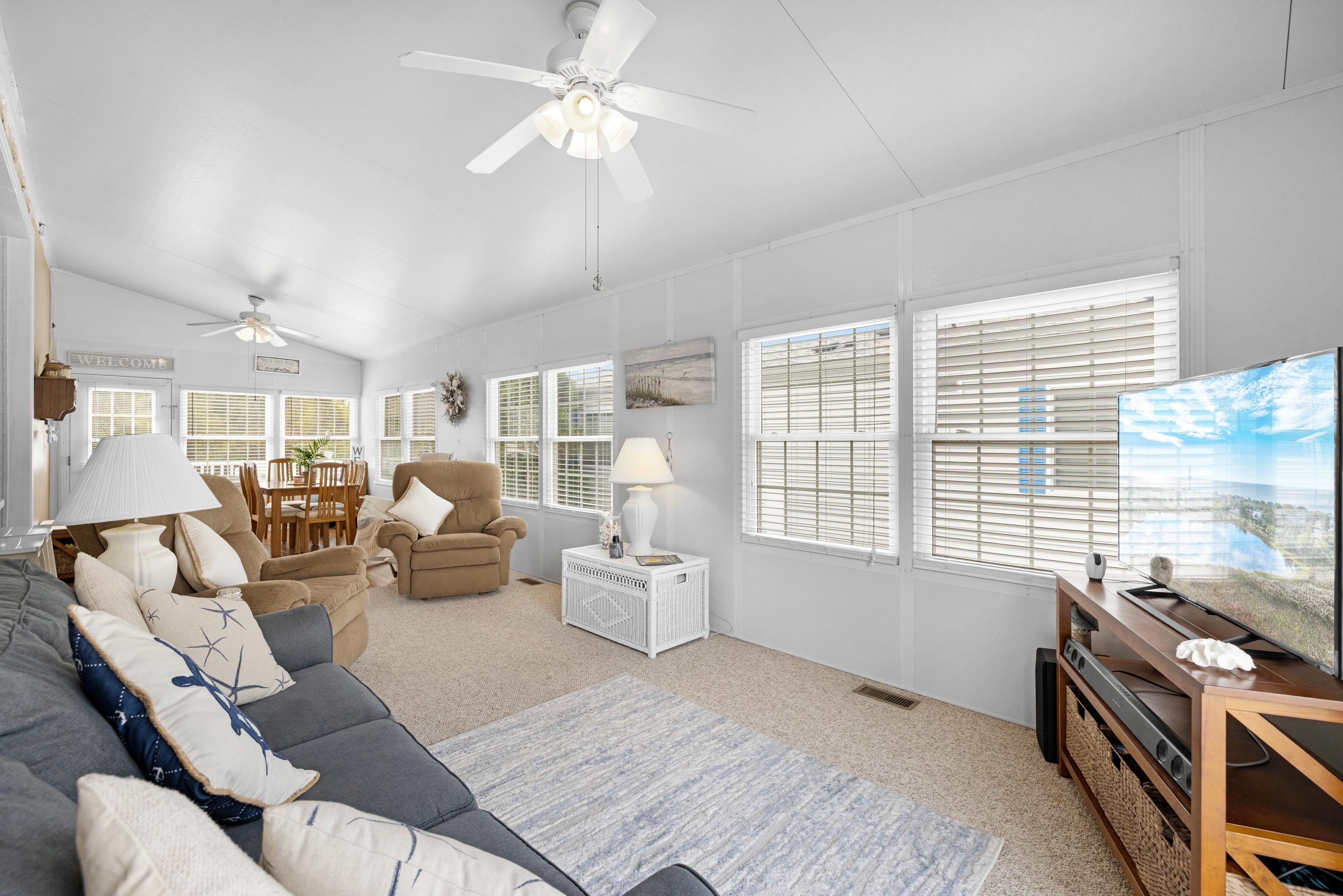 4100 Rte 9 South, Unit 6 Rio Grande, NJ 08242 - Photo 6 of 24 a living room with furniture and a window