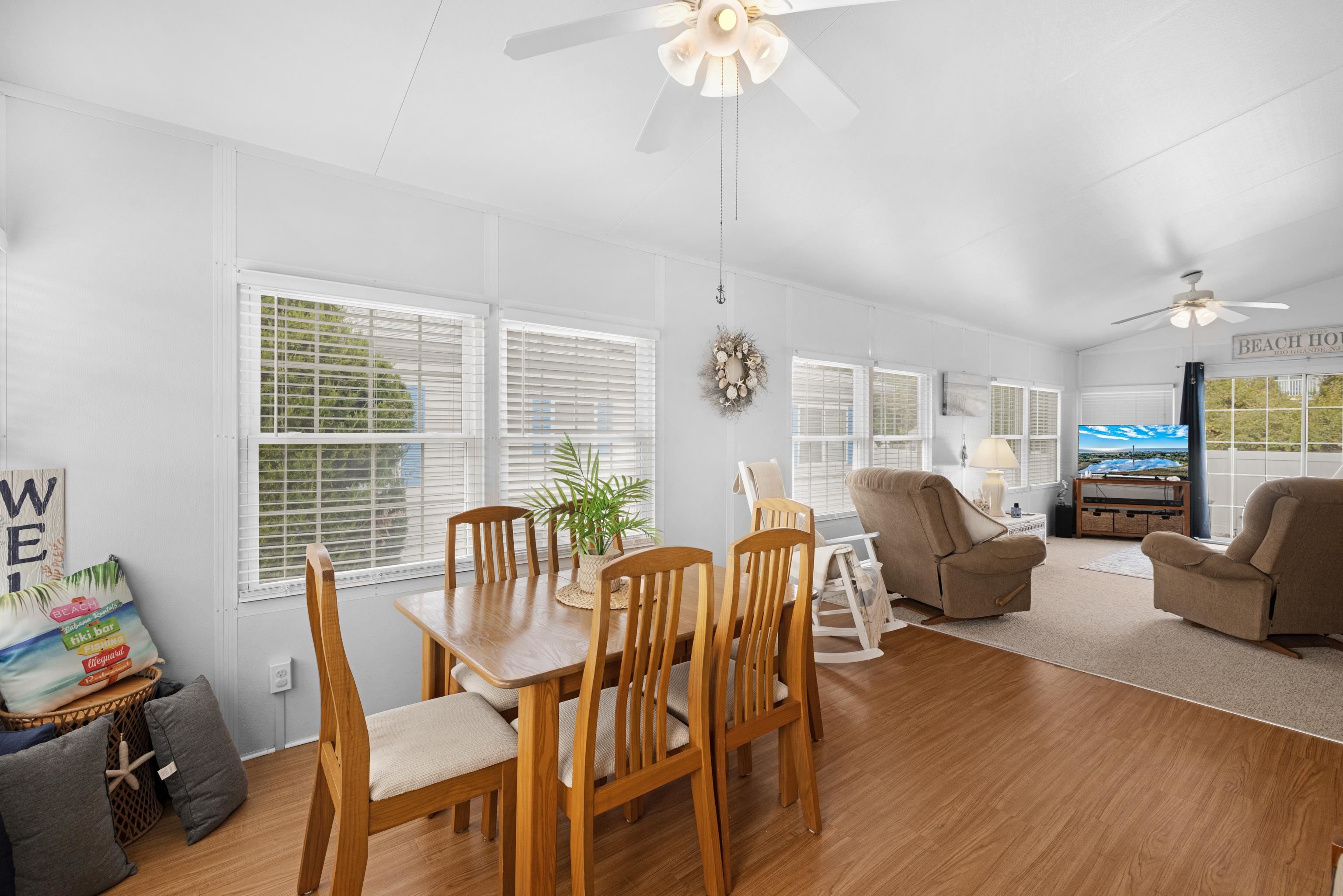 4100 Rte 9 South, Unit 6 Rio Grande, NJ 08242 - Photo 7 of 24 a view of a dining room with furniture window and wooden floor