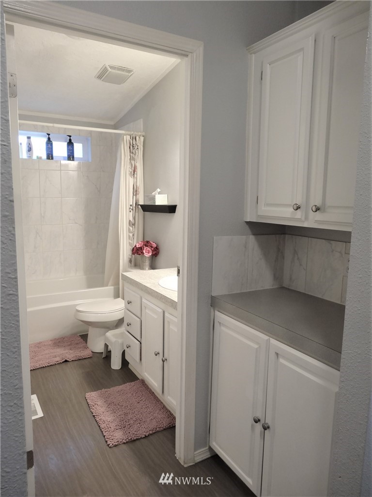 8118 Pony Express Way Maple Falls, WA 98266 - Photo 14 of 35 a bathroom with a sink a toilet and shower