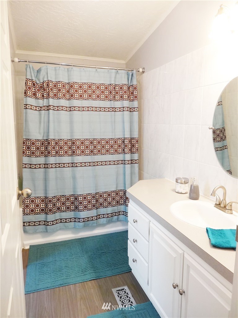 8118 Pony Express Way Maple Falls, WA 98266 - Photo 22 of 35 a bathroom with a sink and a mirror