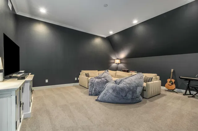an aerial view of house with yard swimming pool and outdoor seating