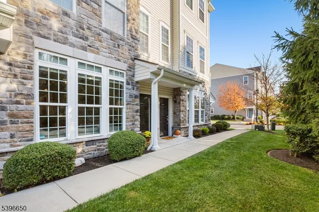 a view of a building with a garden