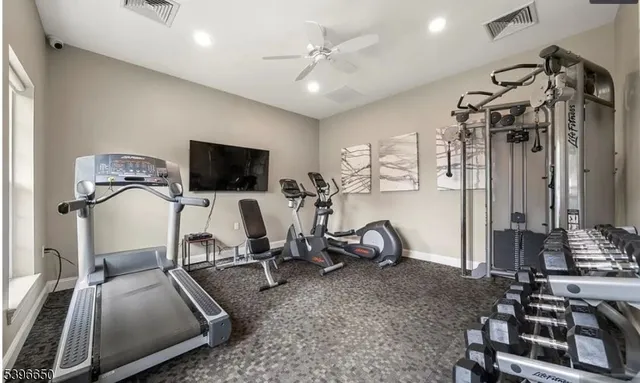 a view of a room with gym equipment