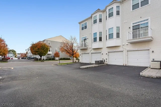 a view of a street with a building