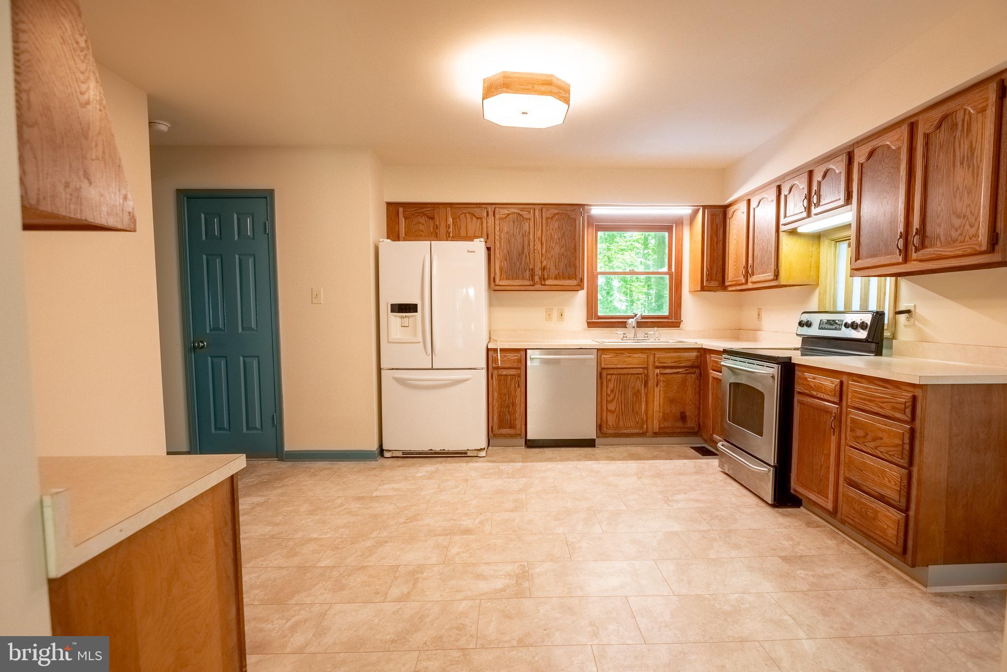 960 Bowie Shop Road Huntingtown, MD 20639 - Photo 58 of 69 a kitchen with a cabinets and window