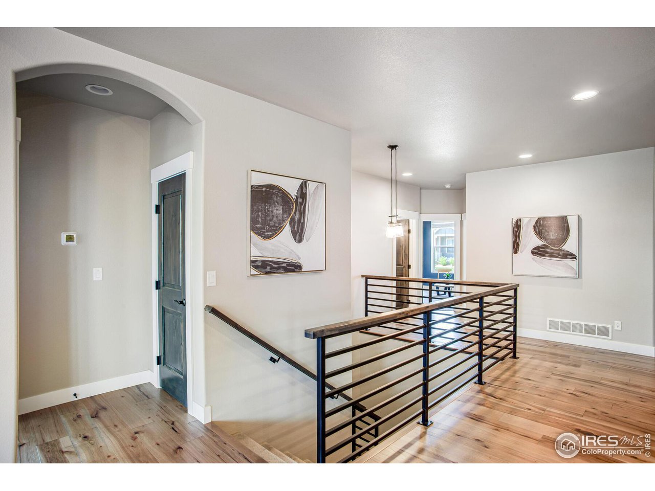 1927 Rolling Wind Drive Windsor, CO 80550 - Photo 13 of 31 a view of a hallway with seating area