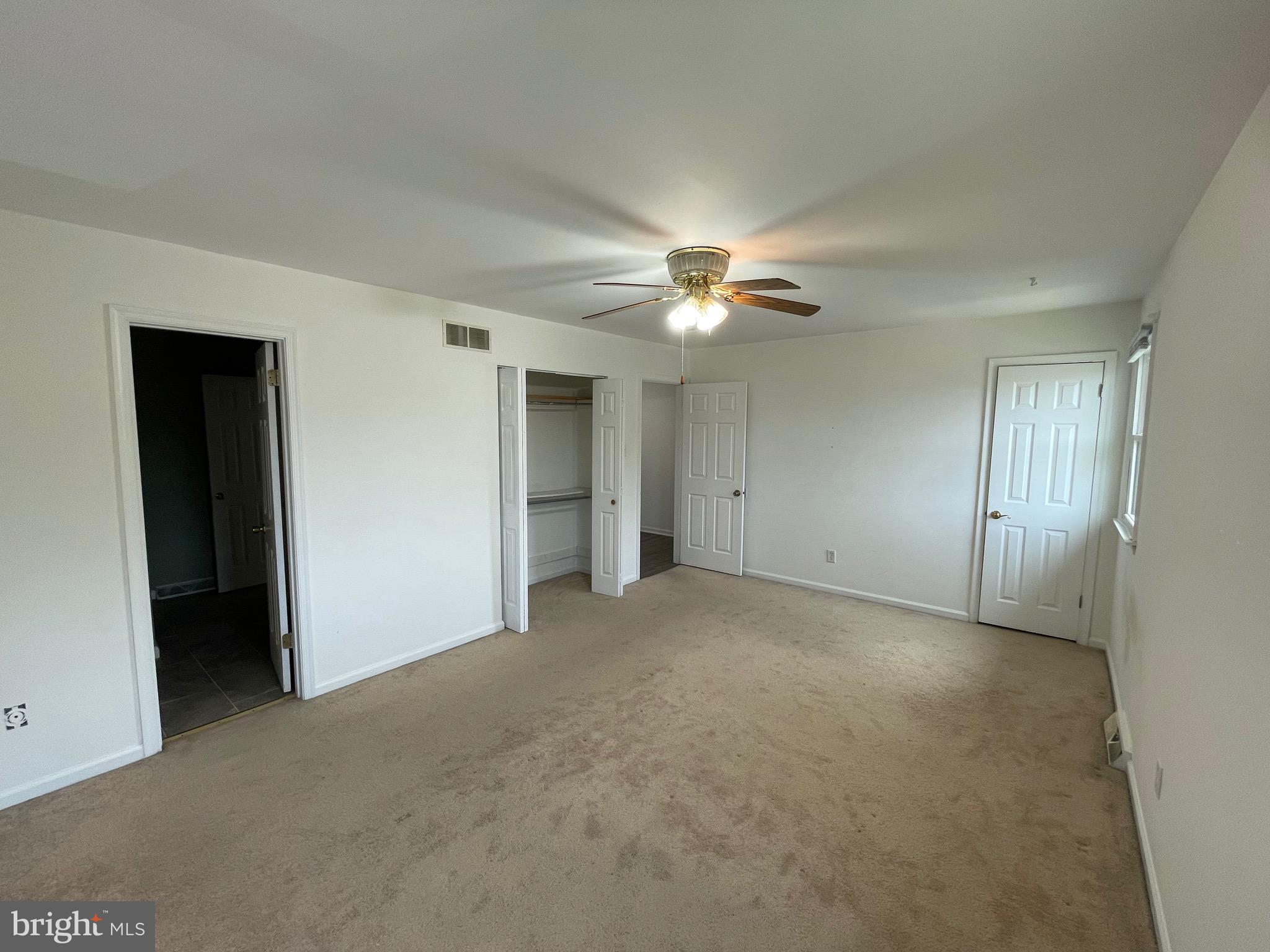 3314 Roxbury Road Hatfield, PA 19440 - Photo 16 of 26 a view of an empty room with chandelier fan