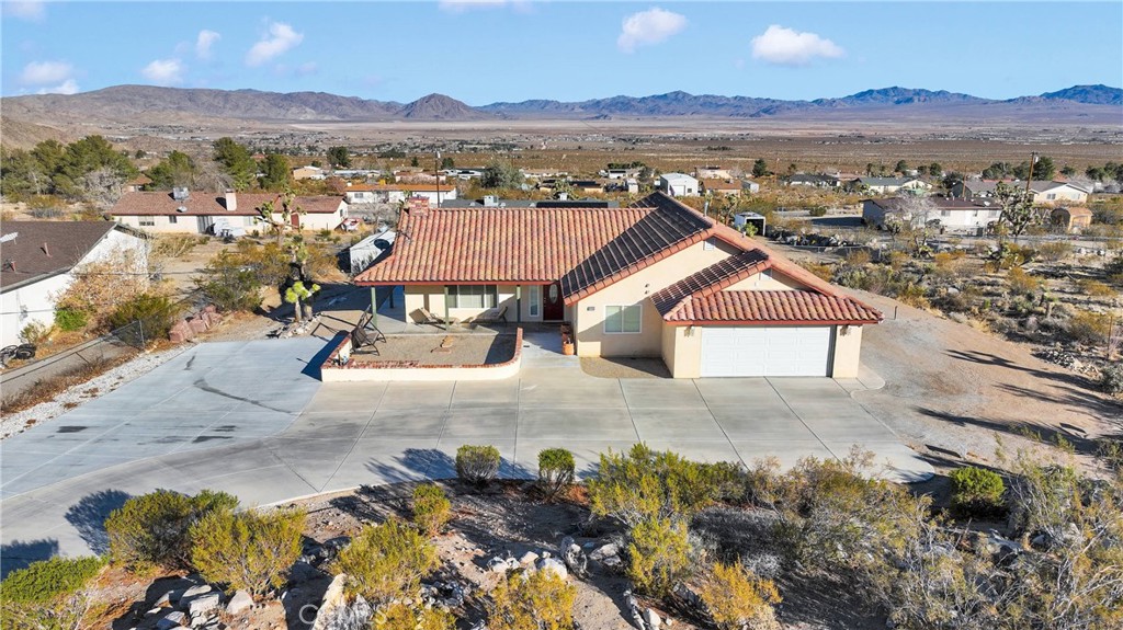 32758 Spinel Road Lucerne Valley, CA 92356 - Photo 33 of 40 a view of residential houses with outdoor space