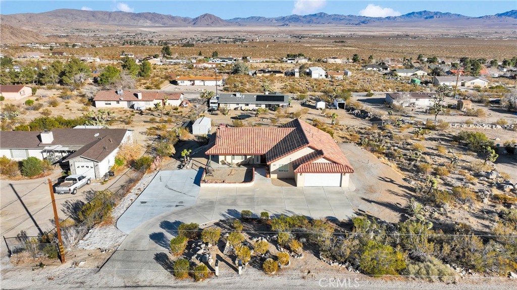 32758 Spinel Road Lucerne Valley, CA 92356 - Photo 34 of 40 an aerial view of residential houses with outdoor space
