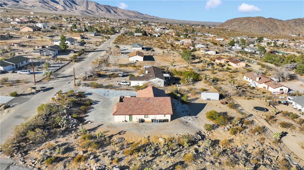 32758 Spinel Road Lucerne Valley, CA 92356 - Photo 35 of 40 an aerial view of residential houses with outdoor space