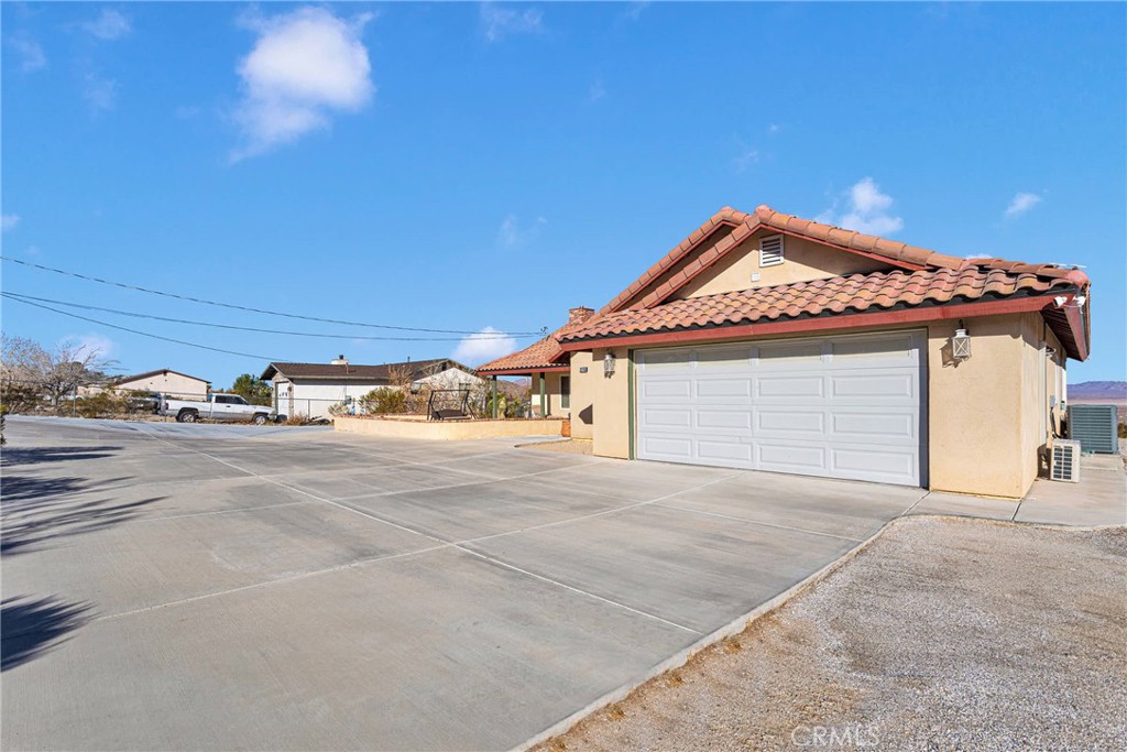32758 Spinel Road Lucerne Valley, CA 92356 - Photo 40 of 40 front view of a house with a road