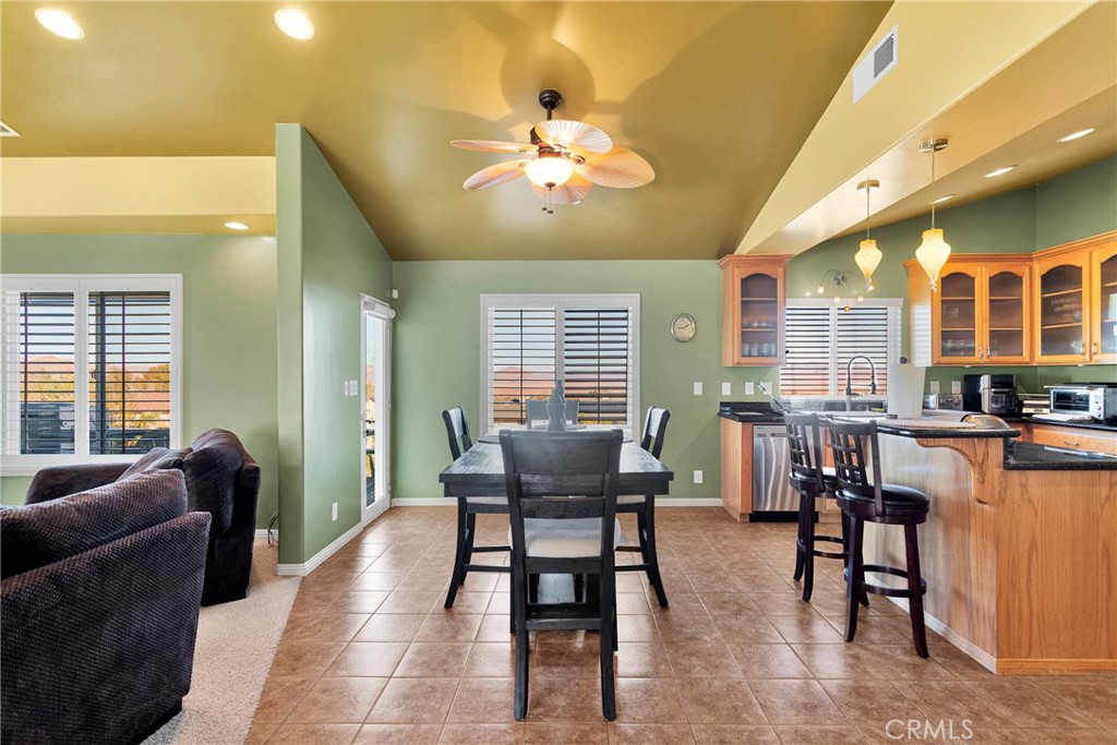 32758 Spinel Road Lucerne Valley, CA 92356 - Photo 6 of 40 a view of a dining room with furniture window and outside view