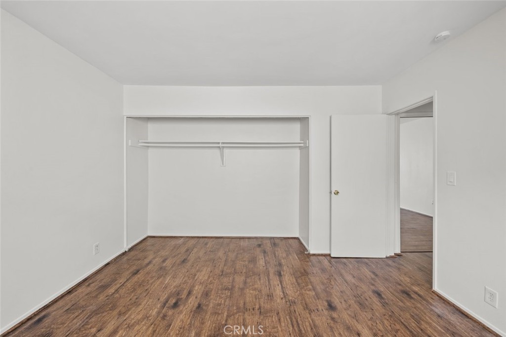1601 College View Drive, Unit 12 Monterey Park, CA 91754 - Photo 26 of 27 an empty room with wooden floor