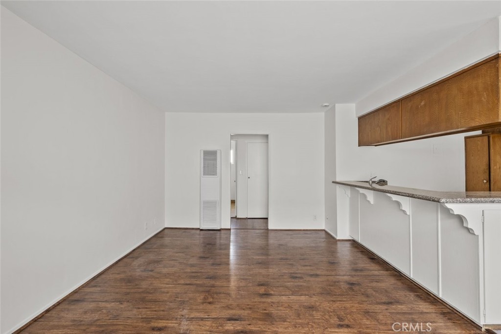 1601 College View Drive, Unit 12 Monterey Park, CA 91754 - Photo 4 of 27 a view of a kitchen with wooden floor