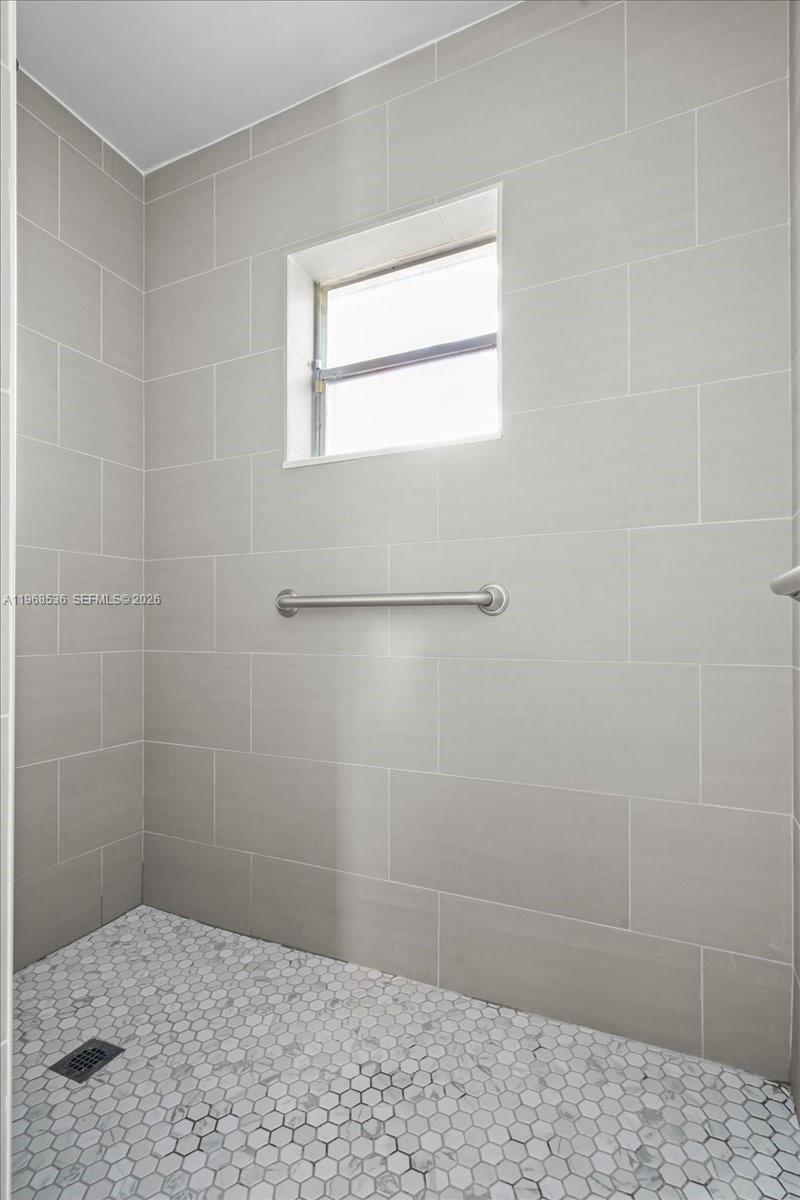 17490 Southwest 288th Street Homestead, FL 33030 - Photo 61 of 80 a bathroom with a shower