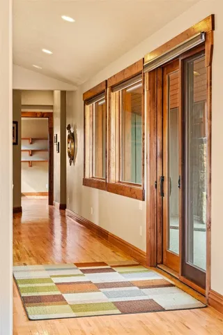 a view of wooden floor and staircase in a room