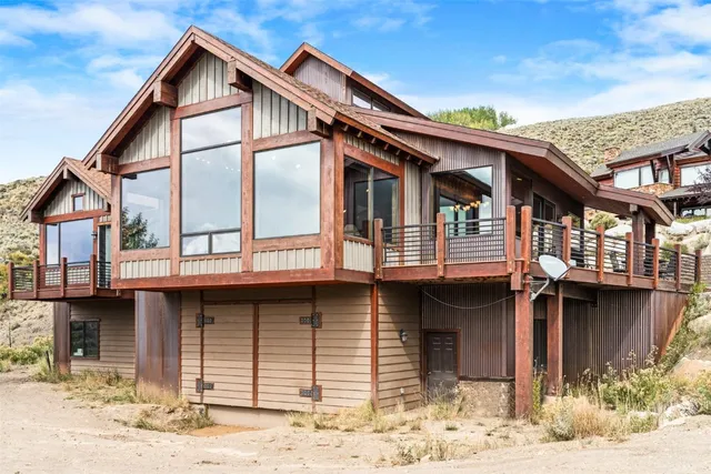 front view of a house with a swimming pool