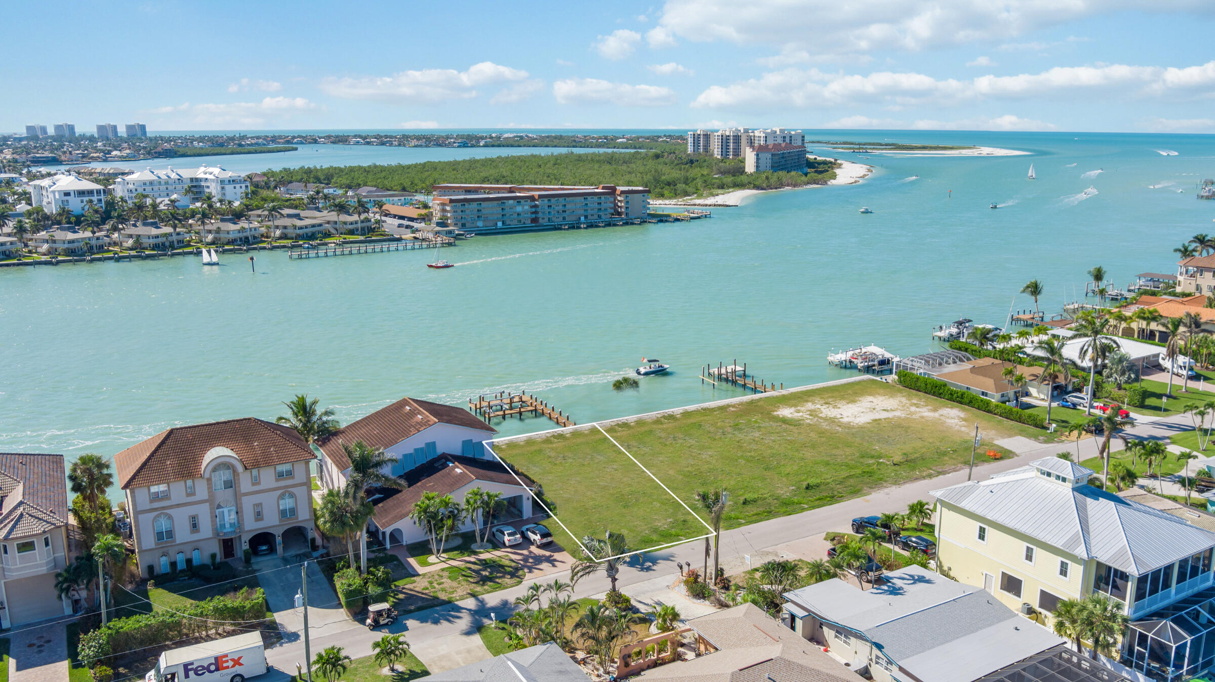 an aerial view of a house with a lake view